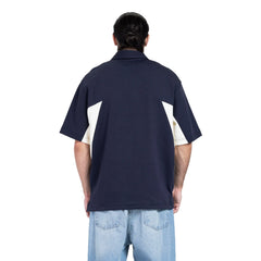 The Quarter-Zip Paneled Polo